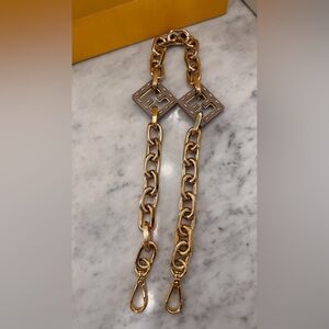 Fendi- Strap brass calf leather .Gold Chain Strap with Geometric Accents
